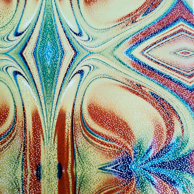Lycra Fantasia Laminata fenice gialla Lycra Fantasia Laminata Astra Giallo Rosso - immagine 1